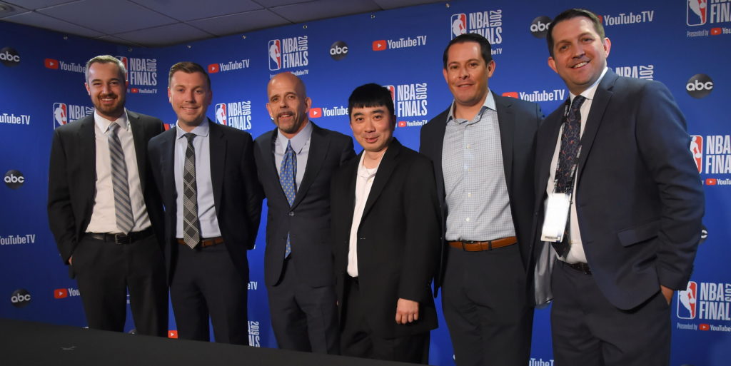 The Golden State Warriors' basketball communications team of (from L to R) Brett Winkler, Cole Lawrence, Raymond Ridder, Darryl Arata and Michael Ravina has won 2018-19 Brian McIntyre Award. On June 7, 2019, PBWA member Jeff Zillgitt of USA Today (far right) and PBWA members honored the Warriors before Game 4 of The Finals. (Bill Baptist/NBA Photos)